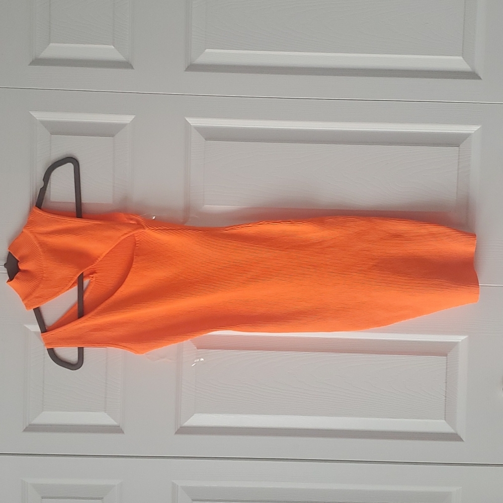 Mini dress by Akira in neon orange.Size medium.